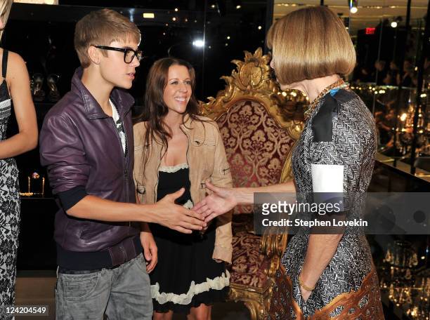 Justin Bieber, Pattie Mallette and Editor-In-Chief of American Vogue, Anna Wintour attend the Dolce & Gabbana celebration during Fashion's Night Out...
