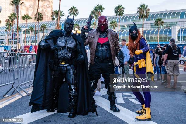 People dressed in cosplay costumes near the San Diego Convention Center where Comic Con is being held on July 21, 2022 in San Diego, California.