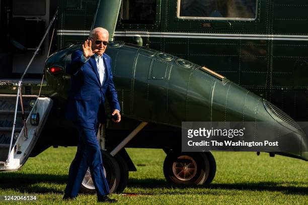 July 20, 2022: US President Joe Biden waves during his arrival to the South Lawn of the White House on July 20, 2022.