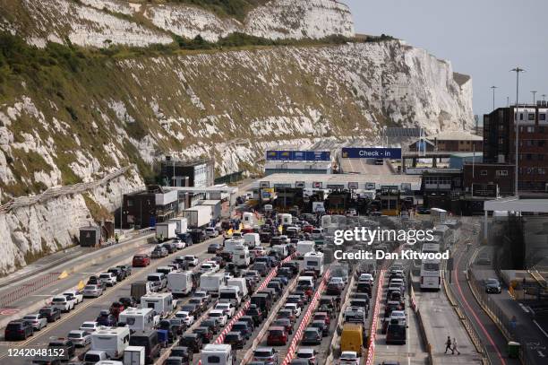 Vehicles queue at the Port of Dover on July 22, 2022 in Dover, England. The Port of Dover declared a “critical incident” today as queues built up due...