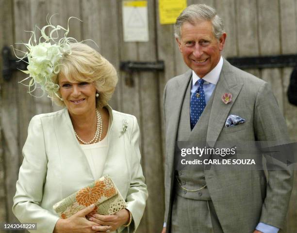 Camilla Parker-Bowles and Prince Charles arrive at Lacock Cyraiax Church for the wedding of Harry Lopes and Laura Parker-Bowles, daughter of Camilla...