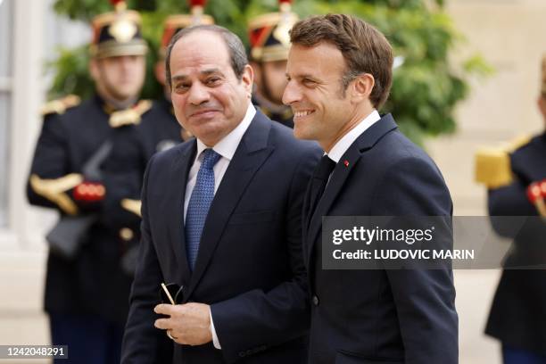 France's President Macron welcomes Egypt's President Abdel Fattah al-Sisi at the Elysee Palace in Paris on July 22, 2022.