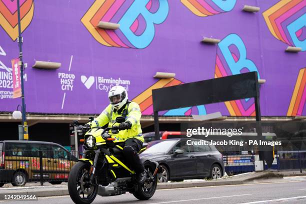 West Midlands police officer with an all-electric Harley Davidson 'LiveWire' motorcycle by New Street station, Birmingham, ahead of the commonwealth...