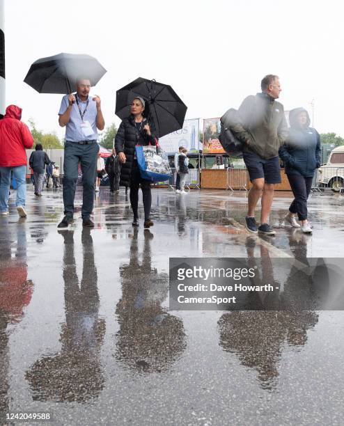 Fans brave the wet weather before the Royal London Series 3rd ODI between England and South Africa at Headingley on July 24, 2022 in Leeds, England.