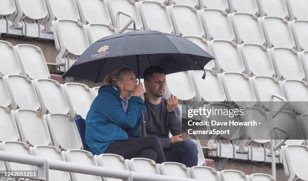 Fans brave the elements before the Royal London Series 3rd ODI between England and South Africa at Old Trafford on July 22, 2022 in Leeds, England.