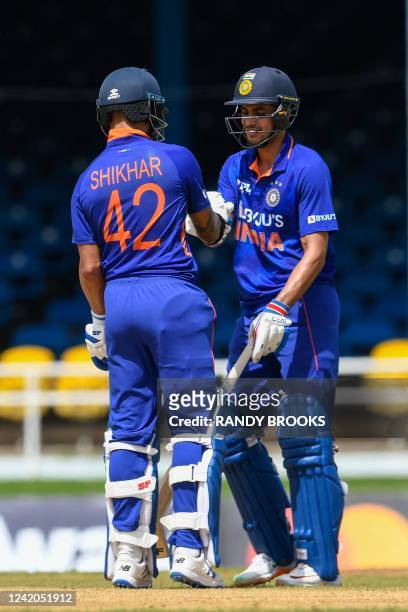 Shikhar Dhawan and Shubman Gill of India 50 runs partnership during the 1st ODI match between West Indies and India at Queens Park Oval, Port of...
