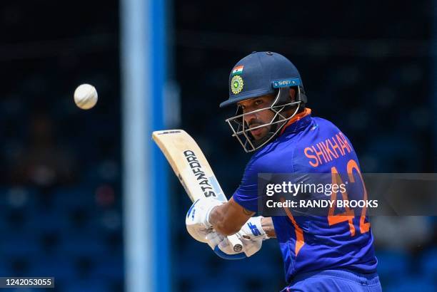 Shikhar Dhawan of India hits 4 during the 1st ODI match between West Indies and India at Queens Park Oval, Port of Spain, Trinidad and Tobago, on...