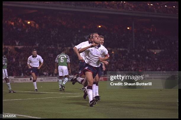 David Platt of England celebrates after scoring the winning goal in the friendly international against Nigeria at Wembley stadium