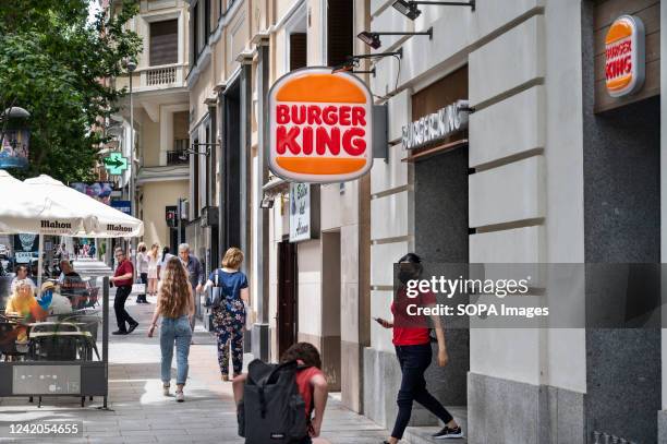 Customer is seen leaving the American fast-food hamburger Burger King restaurant chain in Spain.