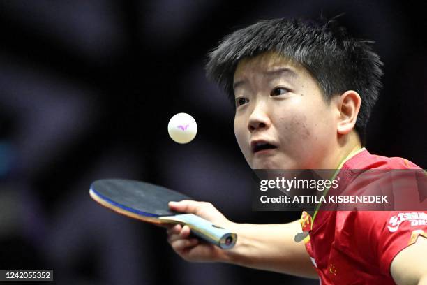 Chinas Sun Yingsha eyes the ball as she serves to Chinas Wang Yidi during their womens singles semi-final of the World Table Tennis Champions...
