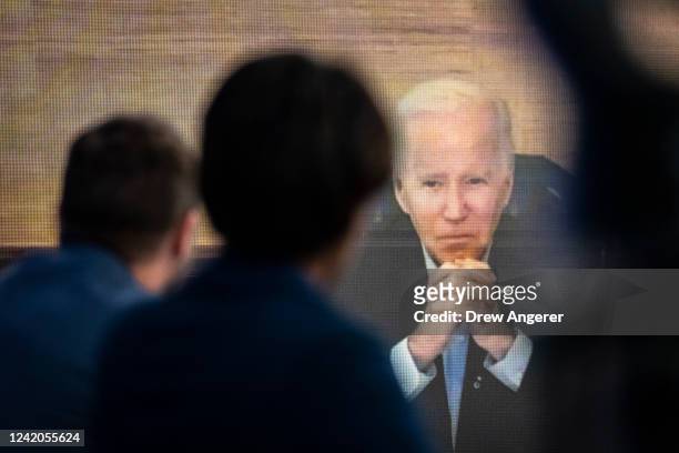 President Joe Biden participates virtually in a meeting with his economic team in the South Court Auditorium of the White House campus July 22, 2022...
