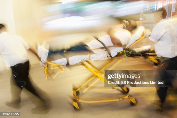 medics transporting patient to hospital - ambulance arrival stock pictures, royalty-free photos & images