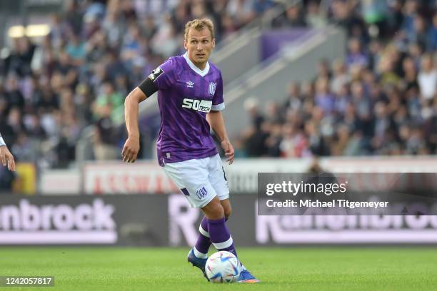 Robert Tesche of Osnabrueck runs with the ball during a match between VfL Osnabrueck and MSV Duisburgat at Stadion an der Bremer Brücke on July 22,...