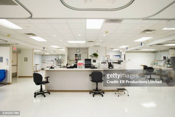 empty nurses station in hospital - hospital interior stock pictures, royalty-free photos & images