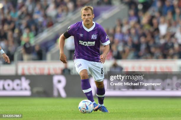 Robert Tesche of Osnabrueck runs with the ball during a match between VfL Osnabrueck and MSV Duisburgat at Stadion an der Bremer Brücke on July 22,...