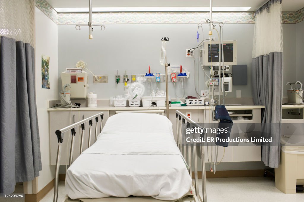 Empty hospital bed in emergency room