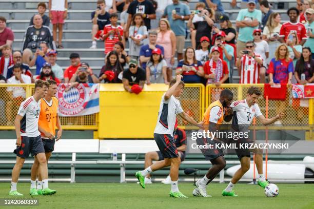 Bayern Munich forward Thomas Muller tries to control the ball during a training session ahead of friendly pre-season match against Manchester City FC...