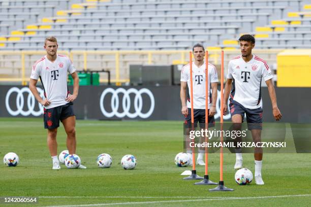 Bayern Munich defender Noussair Mazraoui looks on during a training session ahead of friendly pre-season match against Manchester City FC at Lambeau...