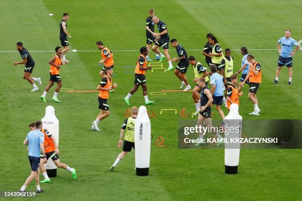 Manchester City FC players run during a training session ahead of friendly pre-season match against FC Bayern Munich at Lambeau Field on July 22,...