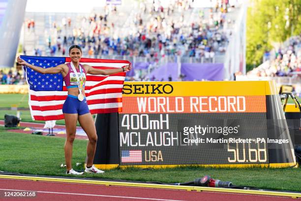 USAs Sydney McLaughlin celebrates next to her World Record time following the Womens 400m Hurdles Final on day eight of the World Athletics...