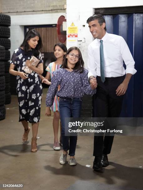 Conservative Leadership hopeful Rishi Sunak with daughters Krisna, Anoushka and wife Akshata Murthy after making a speech while campaigning on July...