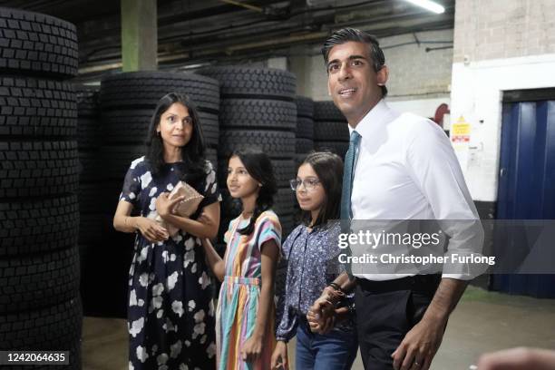 Conservative Leadership hopeful Rishi Sunak with daughters Krisna, Anoushka and wife Akshata Murthy after making a speech while campaigning on July...