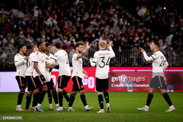 The Manchester United players celebrate the opening goal during the Pre-Season Friendly match between Manchester United and Aston Villa at Optus...