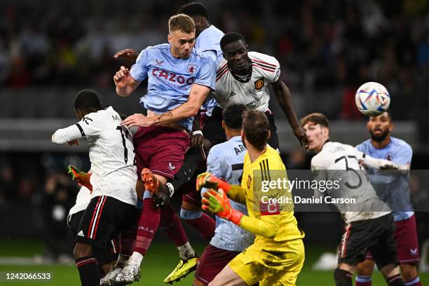 Calum Chambers of Aston Villa headers the ball past the defence of Manchester Utd during the Pre-Season Friendly match between Manchester United and...