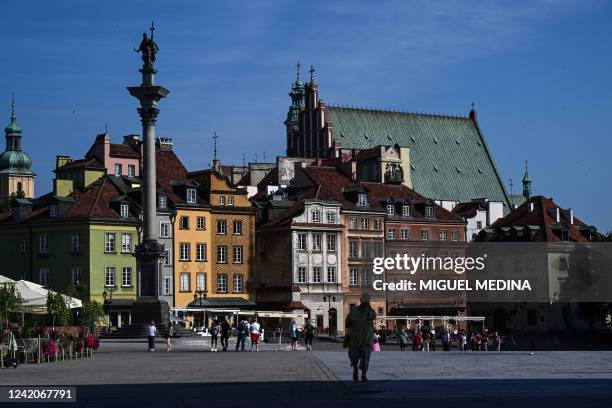 Picture taken on July 23, 2022 shows the architecture of houses in Zamkowy square in front of the Royal Castle in the old city of Warsaw.