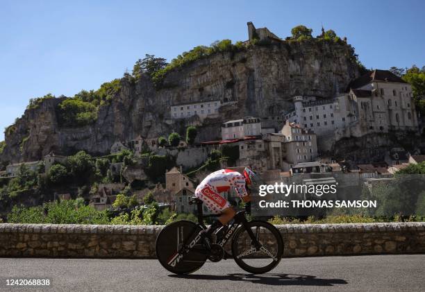 Cofidis team's German rider Simon Geschke wearing the climber's dotted jersey cycles past the town of Rocamadour during the 20th stage of the 109th...