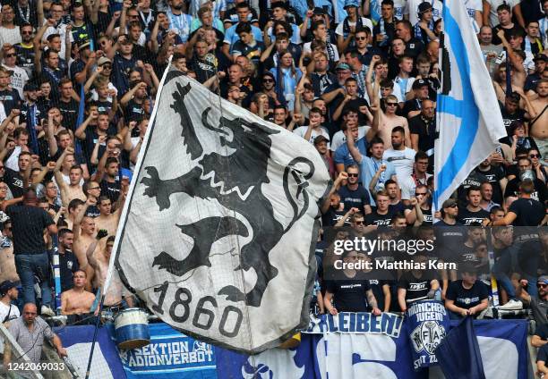 Fans of Muenchen are pictured during the 3. Liga match between SG Dynamo Dresden and TSV 1860 Muenchen at Rudolf-Harbig-Stadion on July 23, 2022 in...