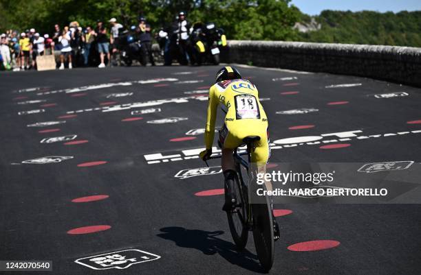 Jumbo-Visma team's Danish rider Jonas Vingegaard wearing the overall leader's yellow jersey cycles during the 20th stage of the 109th edition of the...