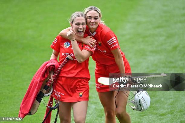 Dublin , Ireland - 23 July 2022; Cork players Aoife Hurley, left, and Emma Flannagan celebrate after their side's victory in the Glen Dimplex Senior...