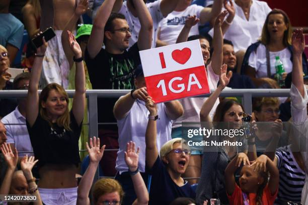 Audience holds banners during 'Iga Swiatek &amp; Friends for Ukraine' charity event in Tauron Arena in Krakow, Poland on July 23, 2022. The total...