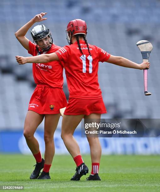 Dublin , Ireland - 23 July 2022; Cork players Saoirse McCarthy, left, and Fiona Keating celebrate after their side's victory in the Glen Dimplex...