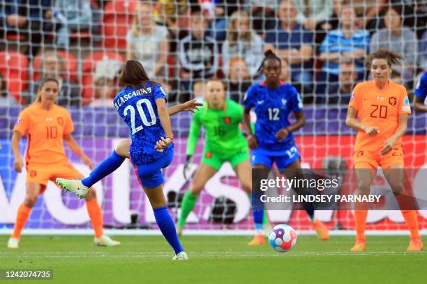 France's striker Delphine Cascarino shoots during the UEFA Women's Euro 2022 quarter final football match between France and Netherlands at the New...