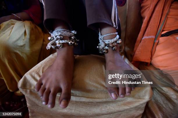 Kanwariyas resting at camp during Kanwar yatra ahead of Shivratri Festival, at Akshardham, on July 23, 2022 in New Delhi, India.