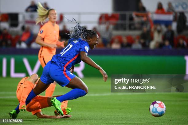 Netherlands' defender Dominique Janssen fouls France's striker Kadidiatou Diani during the UEFA Women's Euro 2022 quarter final football match...