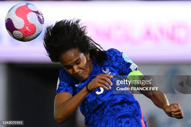 France's defender Wendie Renard heads the ball during the UEFA Women's Euro 2022 quarter final football match between France and Netherlands at the...