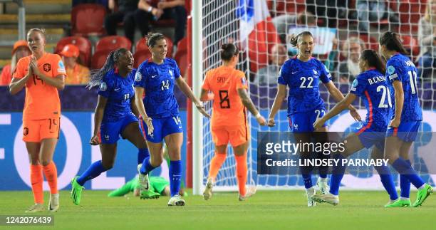 France's defender Eve Perisset celebrates her goal with teammates during the UEFA Women's Euro 2022 quarter final football match between France and...
