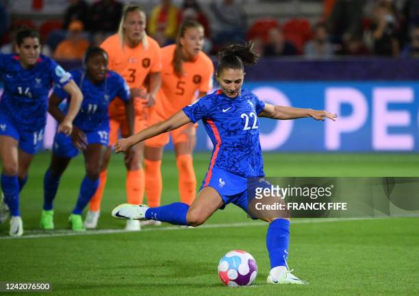 France's defender Eve Perisset shoots a penalty kick and scores a goal during the UEFA Women's Euro 2022 quarter final football match between France...