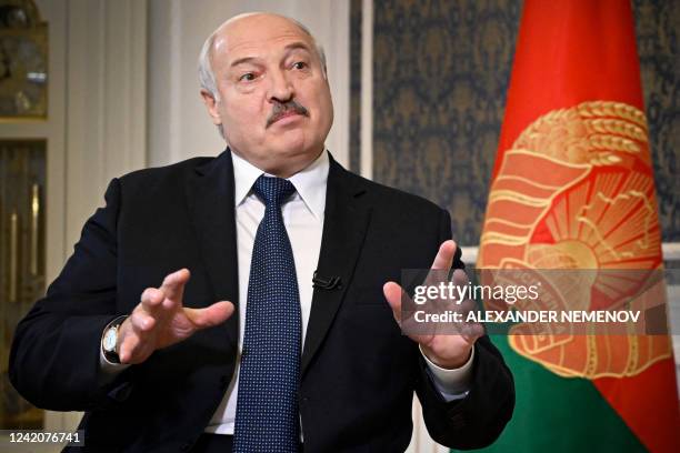 Belarus' President Alexander Lukashenko speaks during an exclusive interview with Agence France-Presse at his residence, the Independence Palace, in...