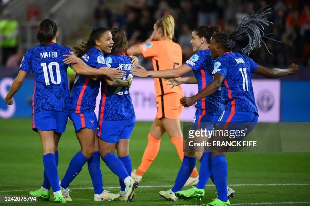 France's defender Eve Perisset celebrates with teammates after scoring a goal during the UEFA Women's Euro 2022 quarter final football match between...