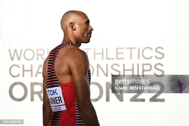 Canada's Damian Warner reacts after pulling out of the the men's decathlon event with an injury during the World Athletics Championships at Hayward...