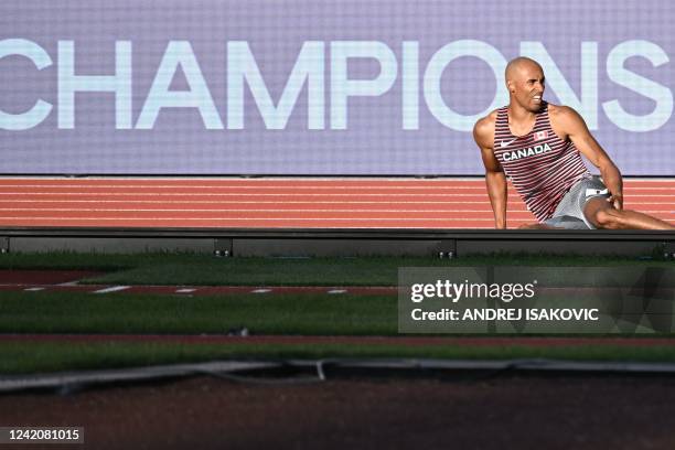 Canada's Damian Warner reacts after an injury while competing in the men's 400m decathlon event during the World Athletics Championships at Hayward...