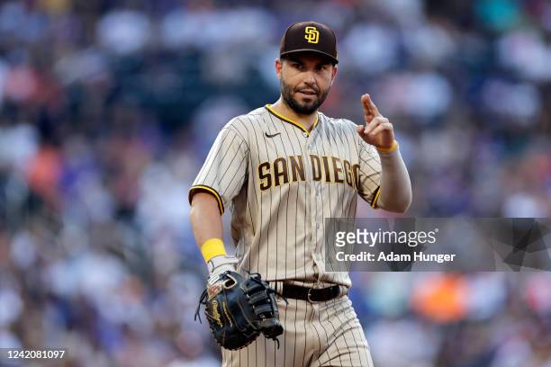 Eric Hosmer of the San Diego Padres gestures to the stands during the first inning against the New York Mets at Citi Field on July 23, 2022 in New...