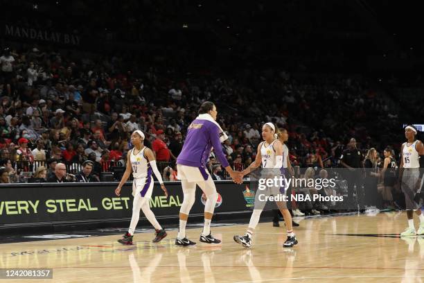 Liz Cambage of the Los Angeles Sparks high fives Chennedy Carter of the Los Angeles Sparks on July 23, 2022 at Michelob ULTRA Arena in Las Vegas,...