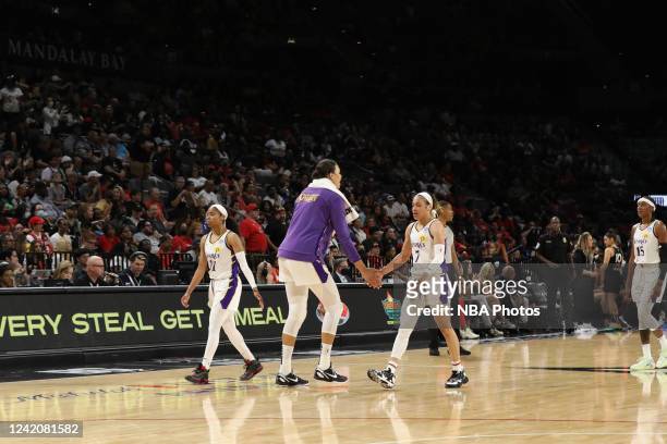 Liz Cambage of the Los Angeles Sparks high fives Chennedy Carter of the Los Angeles Sparks on July 23, 2022 at Michelob ULTRA Arena in Las Vegas,...