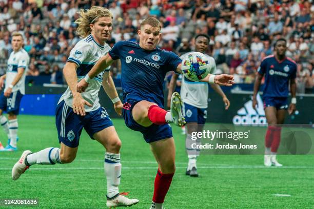 Chris Mueller of the Chicago Fire FC controls the ball against Vancouver Whitecaps FC at BC Place on July 23, 2022 in Vancouver, Canada.