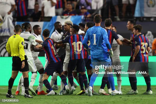 Real Madrid and Barcelona clash during the preseason friendly match between Real Madrid and Barcelona at Allegiant Stadium on July 23, 2022 in Las...